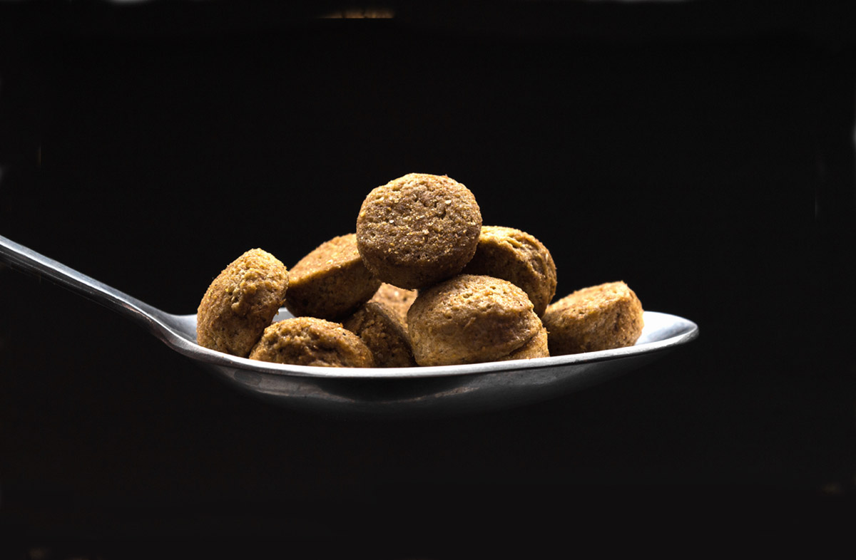 Скільки грам сухого корму в столовій ложці